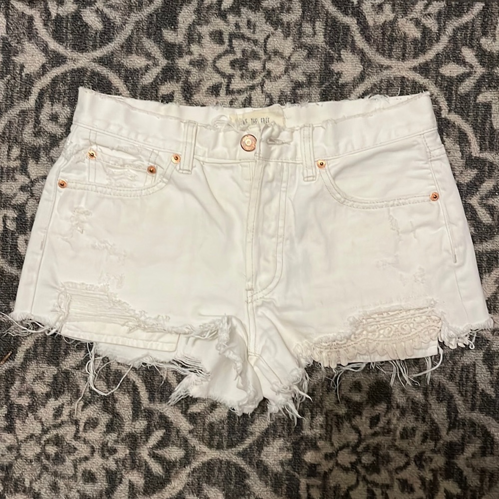 We the Free. White distressed denim high rise jean shorts.